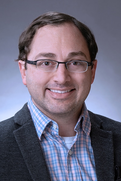 1764612773_Head-shot-2-1